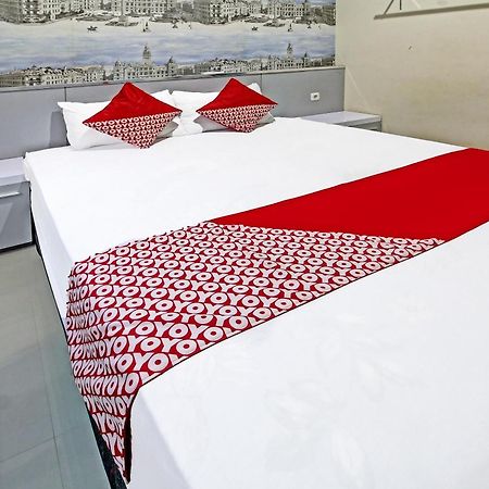 Super Oyo 91202 Family Guest House Syariah ตุลุงอากุง ภายนอก รูปภาพ