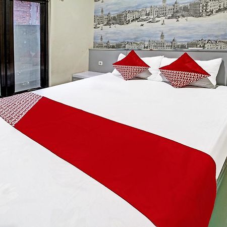 Super Oyo 91202 Family Guest House Syariah ตุลุงอากุง ภายนอก รูปภาพ